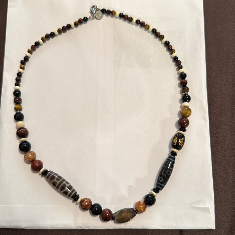 Powerful 9 eyed DZI bead necklace